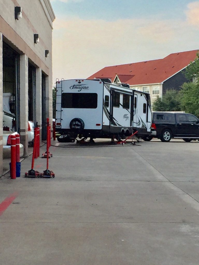 Changing the tires in anticipation of the trek northward.